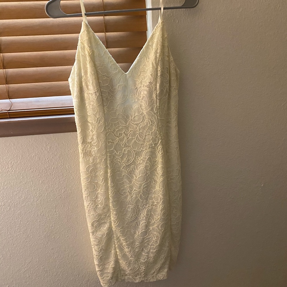 white lacy body-con mini dress